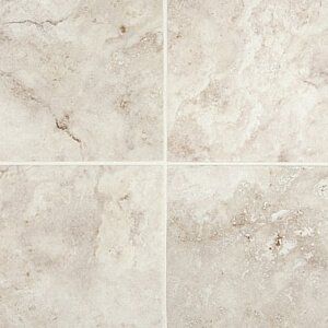 Four beige stone tile squares with subtle marbled texture