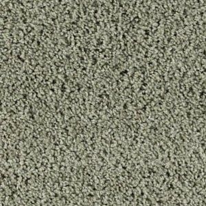 Close-up of gray-green textured carpet fibers