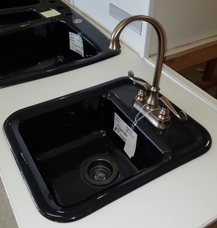 Modern Sink Faucet Display — Jonesboro, AR — Mid-South Plumbing & Electric