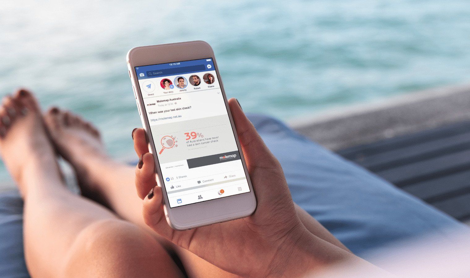 Someone using Facebook on a mobile showing a Molemap ad