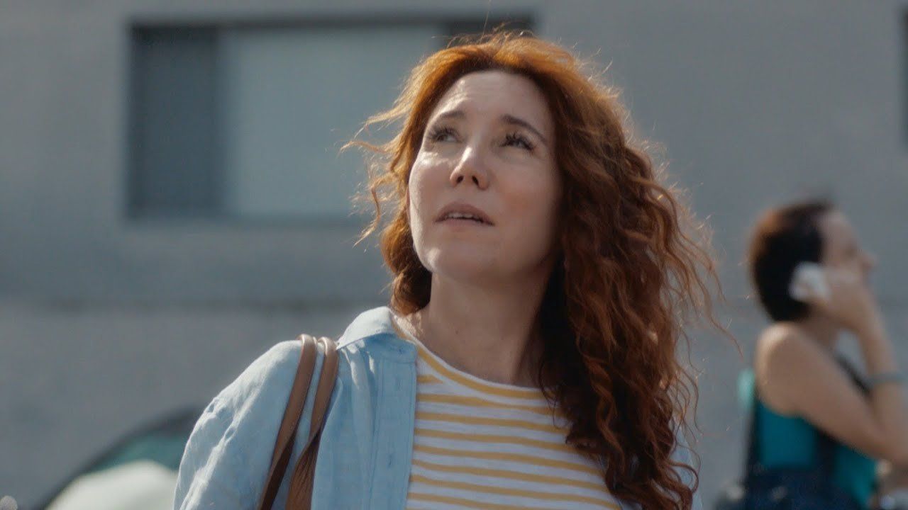 A woman looking at the sky