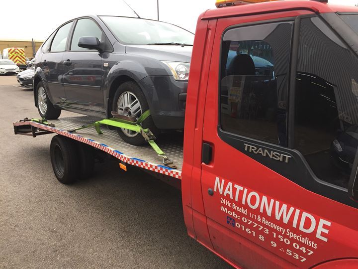 car on recovery truck