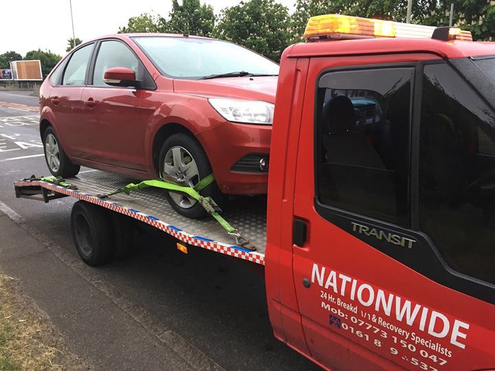 car on recovery lorry