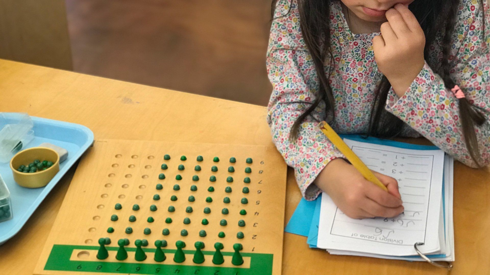 Second grade child with math lesson