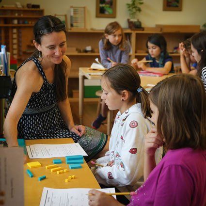 Elementary students with guide