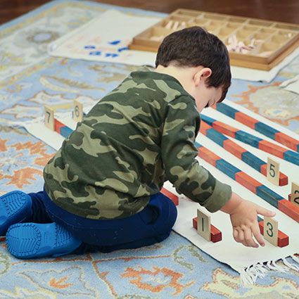 Child with unit blocks