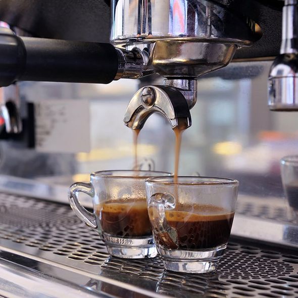 Espresso Machine Filling Two Cups of Coffee — Cadillac, MI — All Beans Coffee Company