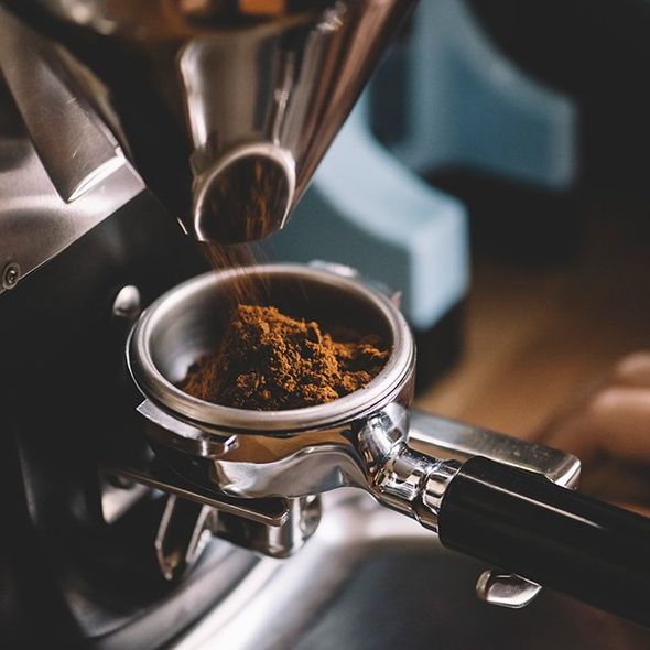 Coffee Beans in A Portafilter — Cadillac, MI — All Beans Coffee Company
