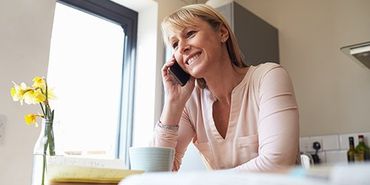 Women Calling For Repair — Heating System Repairs in Lorton, VA Women Calling For Repair — Heating System Repairs in Lorton, VA