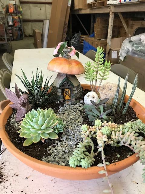 Outdoor Furniture — Girls Decorating Plants in Savannah, GA