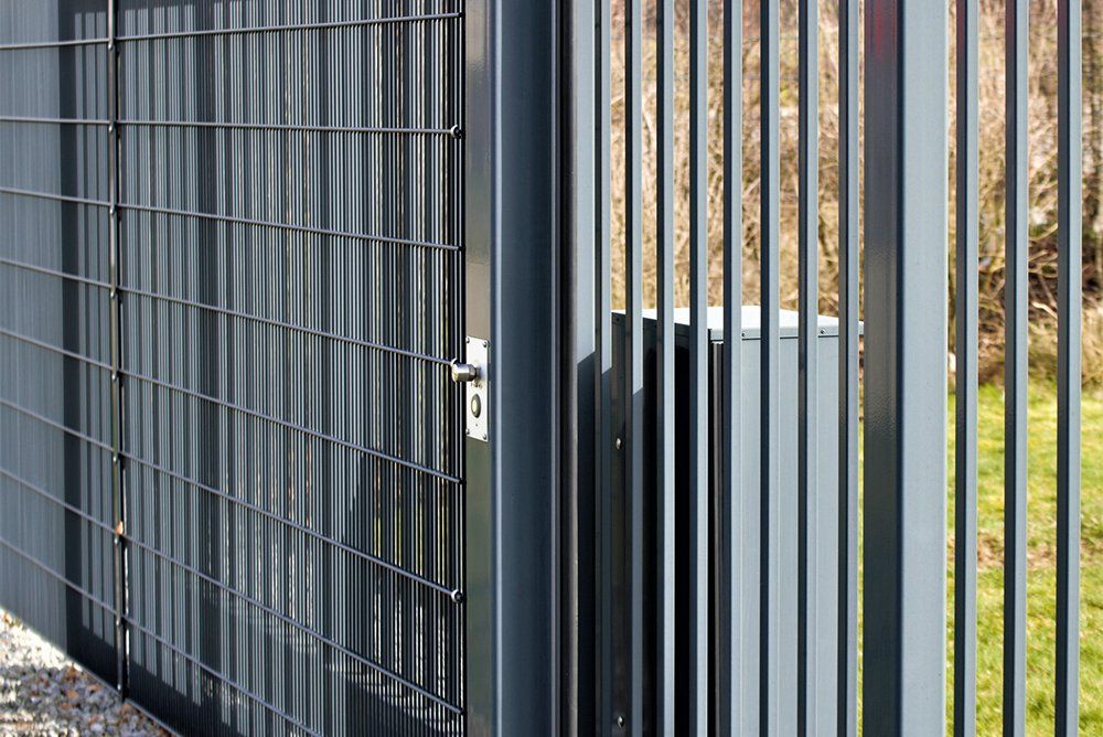 Modern Gray Metal Fence — Atlanta, GA — West Georgia Fence Co Modern Gray Metal Fence — Atlanta, GA — West Georgia Fence Co