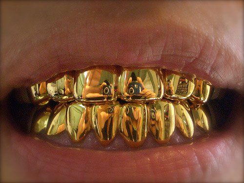 A person with gold crowns