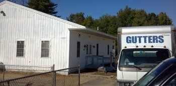 A white utility truck labeled