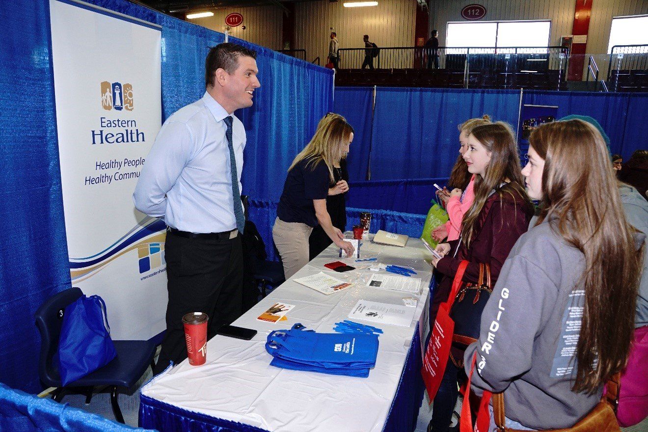 A representative at the Eastern Health booth at JOCBE 2016.