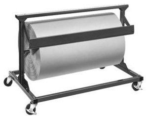 A roll of paper is sitting on top of a cart.