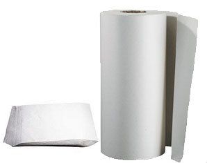 A roll of paper towels next to a pack of paper towels.