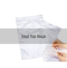 A person is holding a seal top bag in their hand.