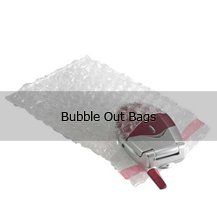 A cell phone is sitting on top of a bubble out bag.