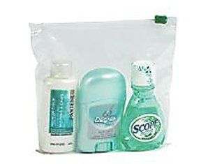 A bag filled with shampoo , deodorant , and lotion.