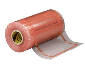 A roll of tape with a yellow sticker on it