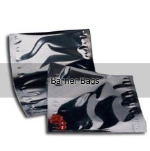 Two barrier bags are sitting next to each other on a white surface.