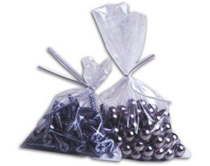 Two clear plastic bags filled with screws and balls