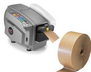 A tape dispenser with a roll of tape next to it.
