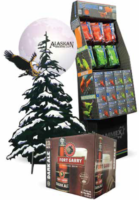 A box of fort carry dark ale sits next to a christmas tree