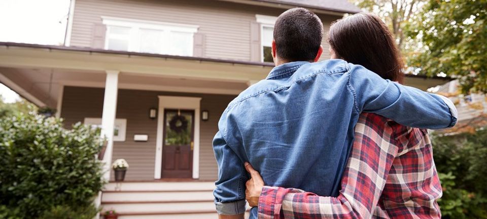 New Home Owners Looking at House