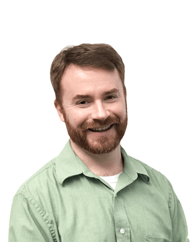 Smiling man in a light green shirt against a white background