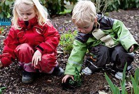 Kids playing in the mud