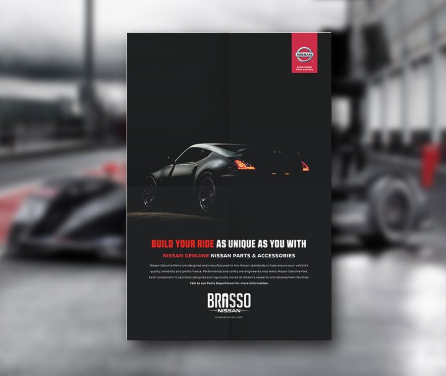 A nissan advertisement with a black car on it