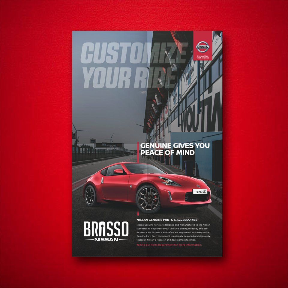 A red nissan car is on a red background.