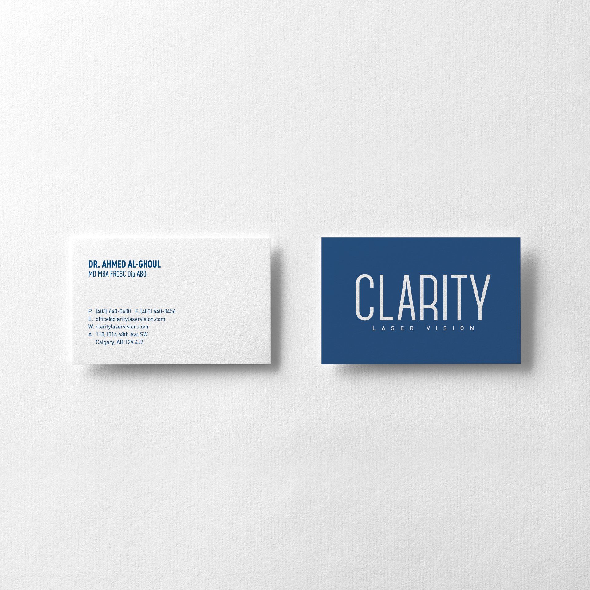 A blue and white business card with the word clarity on it