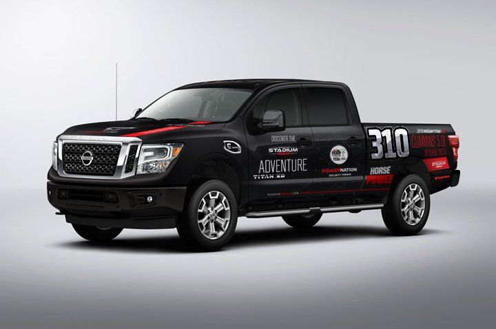 A black truck with the number 310 on the back