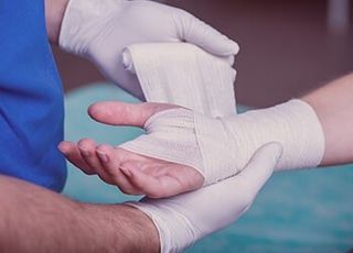 Hand Being Bandaged – Personal Injury in Oak Forest, IL Hand Being Bandaged – Personal Injury in Oak Forest, IL
