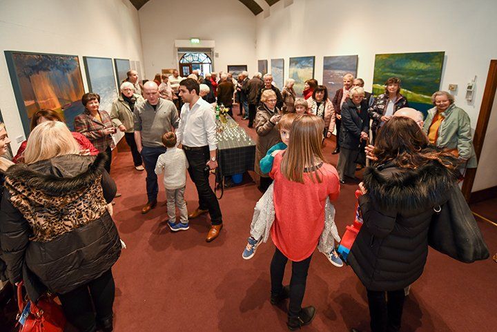 Some of the guests enjoying the exhibition