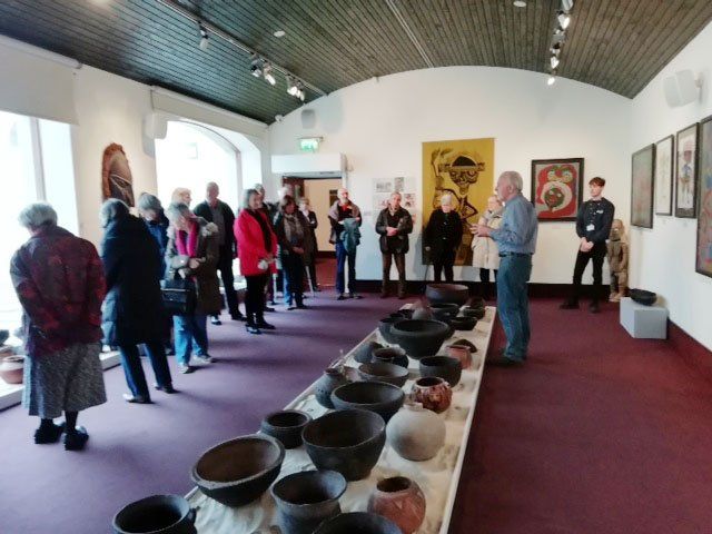 Tom Craig briefing the volunteers who will steward the exhibition.