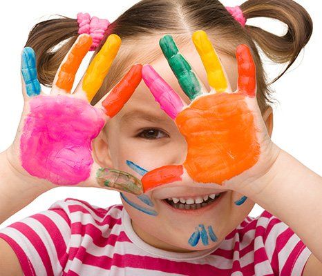 little girl with colourful palm
