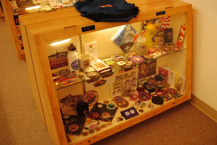 A display case of a large number of scouting badges