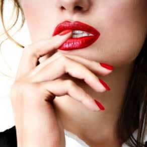 Woman with Red Nails and Red Lips - Make-up in Richboro, PA Woman with Red Nails and Red Lips - Make-up in Richboro, PA
