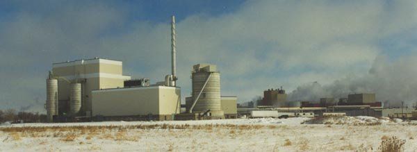 factory with snow on the ground