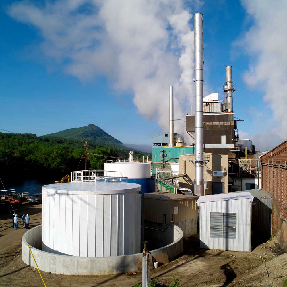 tall chimneys with steam