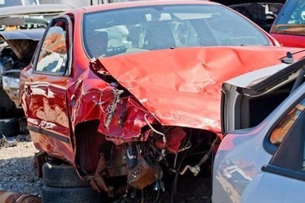 A red scrap car