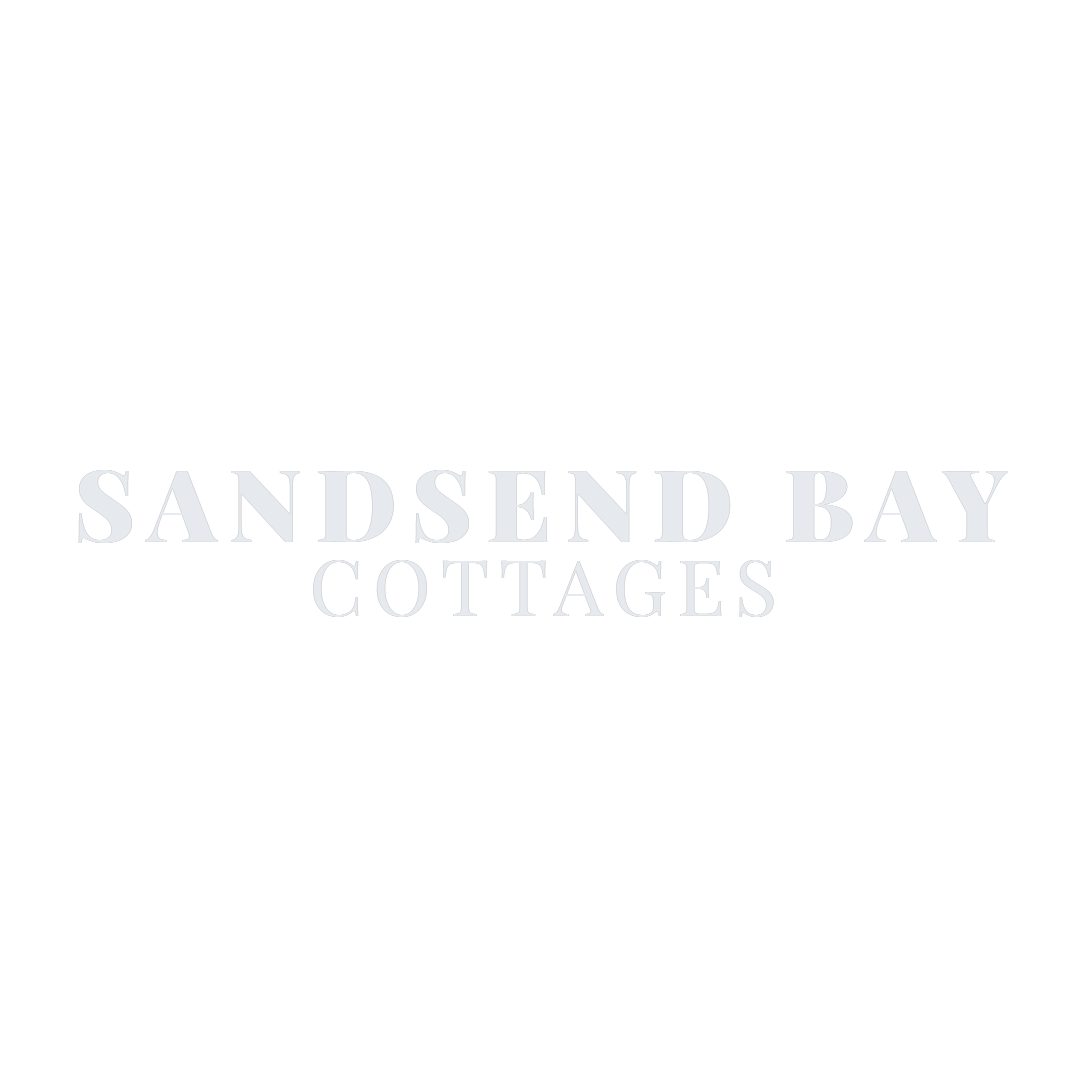 Sandsend Bay Cottages logo in light blue lettering on a white background.