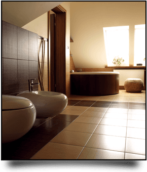 For professional plumbing services in Downpatrick call Downpatrick Plumbers Modern bathroom with brown and cream tiles, brown corner bath, and bidet