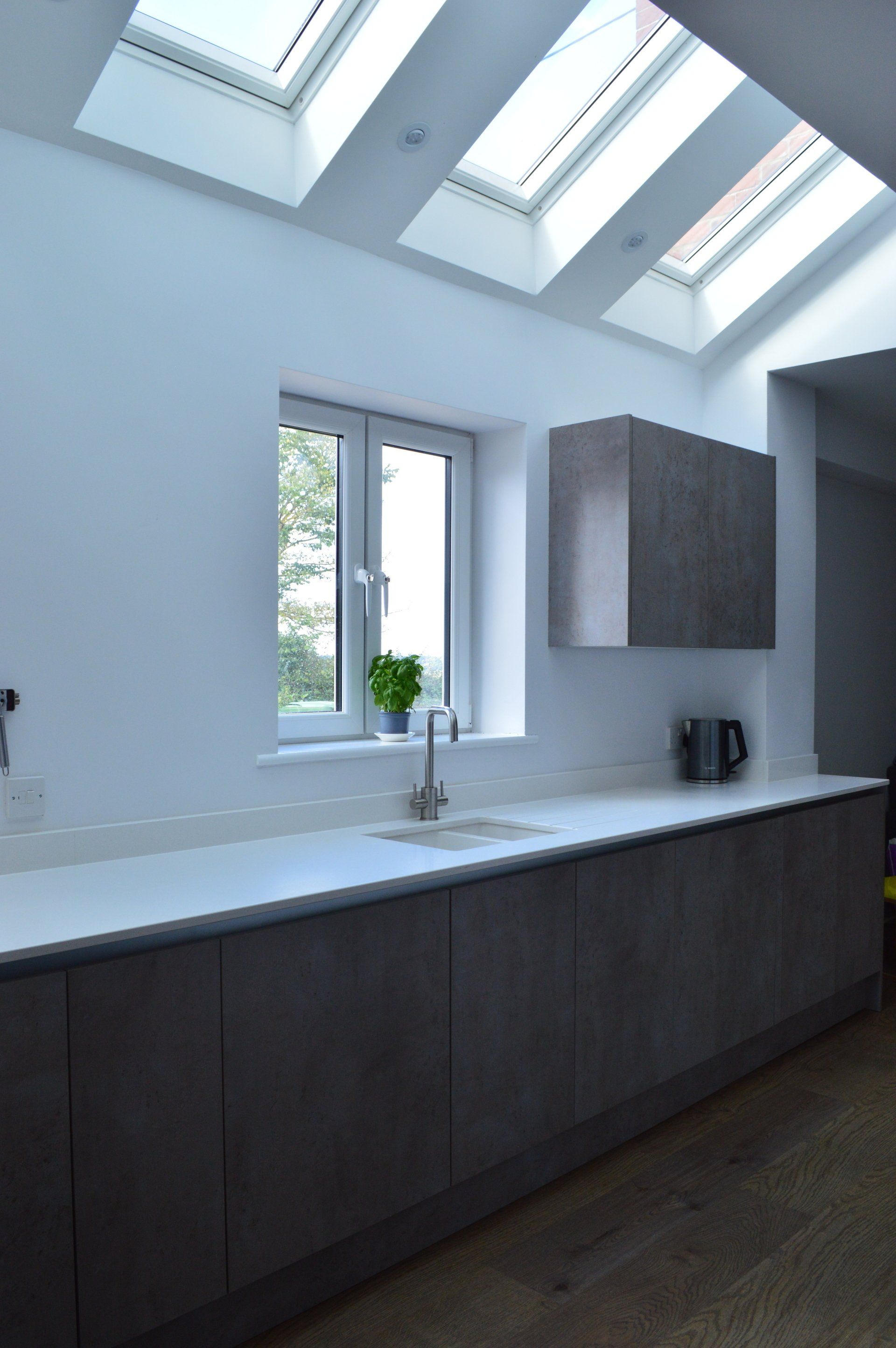 Modern concrete kitchen and dining room completed in 2017