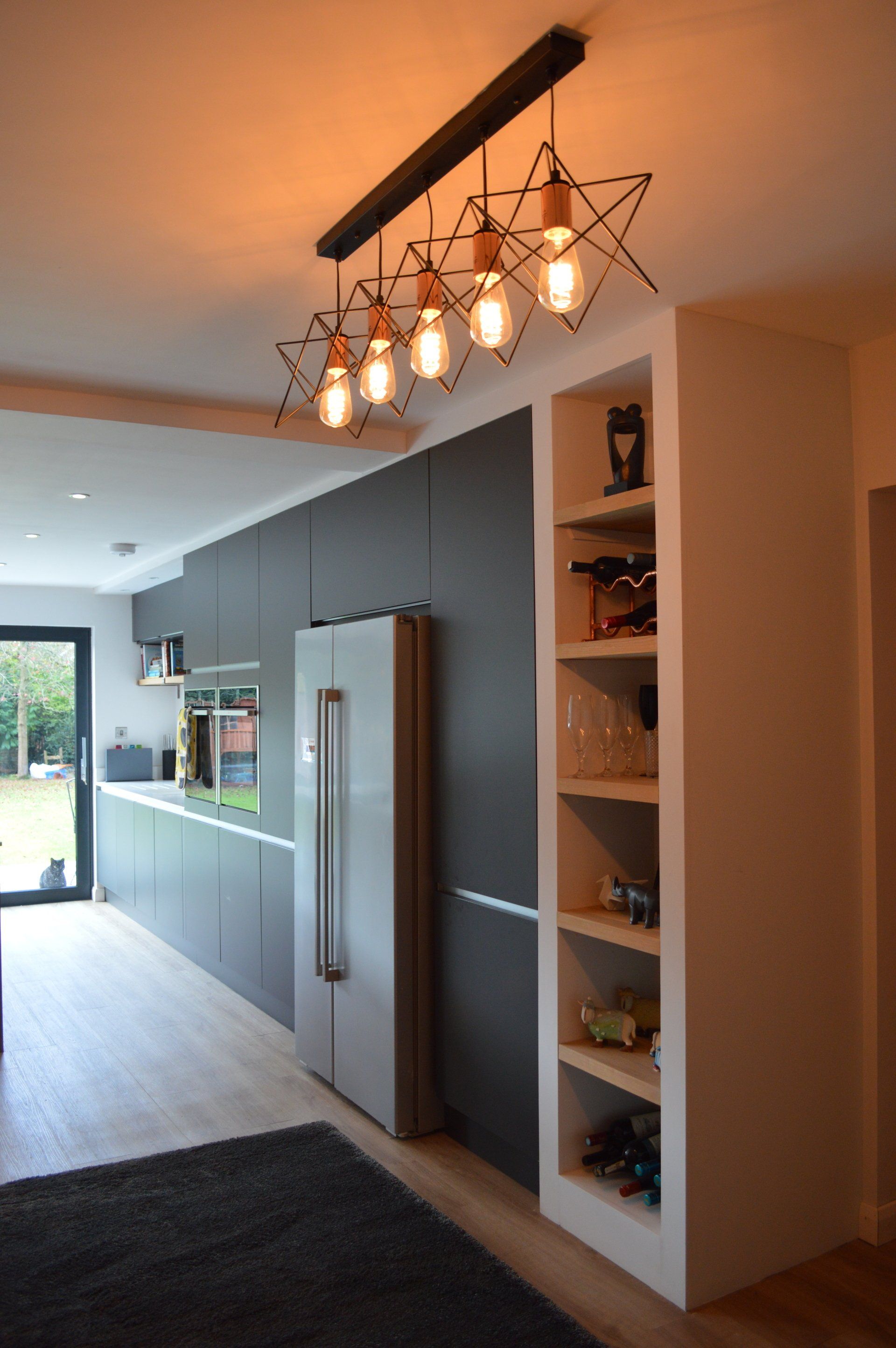 Living area renovation with modern star light fixtures