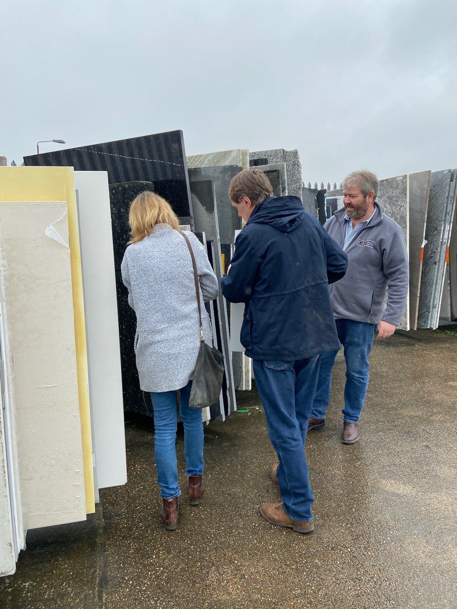 clients looking at worktops at stoneyard