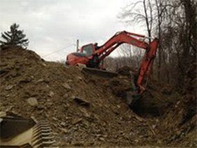 Excavator - Composting - Poolesville, MD - Kuhlman Lawn Service Excavator - Composting - Poolesville, MD - Kuhlman Lawn Service